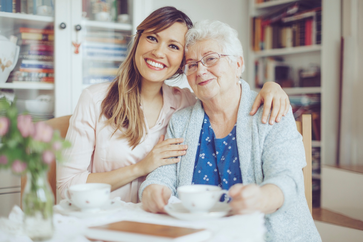 female-supervising-senior-care-for-elderly-woman